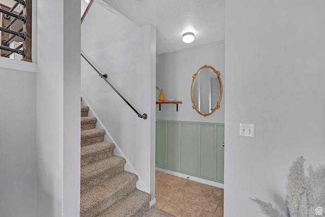 706 E 425 S, Ogden, UT 84404 - stairs featuring baseboards and a textured ceiling