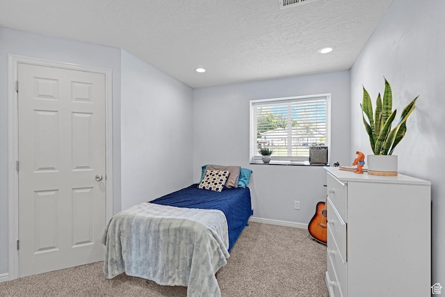 706 E 425 S, Ogden, UT 84404 - bedroom featuring visible vents, baseboards, recessed lighting, a textured ceiling, and carpet flooring