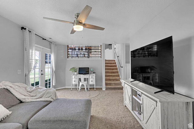 706 E 425 S, Ogden, UT 84404 - living area with ceiling fan, french doors, a textured ceiling, light colored carpet, and stairs
