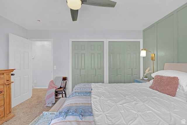 706 E 425 S, Ogden, UT 84404 - carpeted bedroom with a ceiling fan and multiple closets