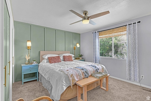 706 E 425 S, Ogden, UT 84404 - carpeted bedroom featuring baseboards, a ceiling fan, a textured ceiling, and visible vents