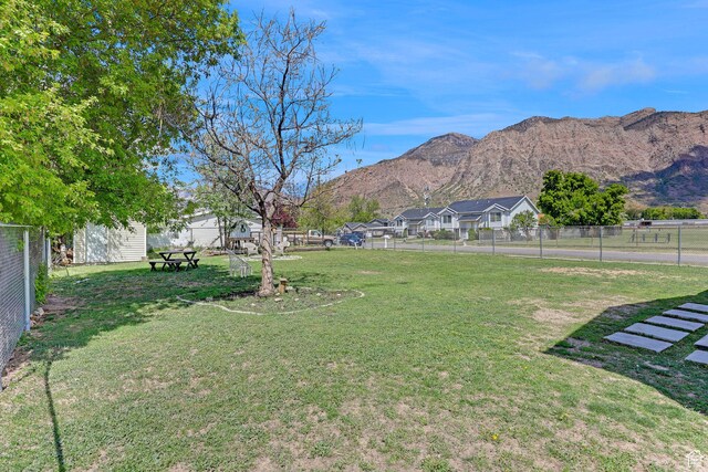 706 E 425 S, Ogden, UT 84404 - view of yard featuring a mountain view, fence, and a residential view