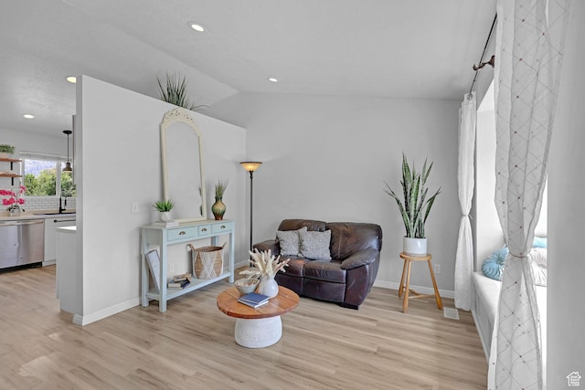 706 E 425 S, Ogden, UT 84404 - sitting room with light wood finished floors, recessed lighting, baseboards, lofted ceiling, and visible vents