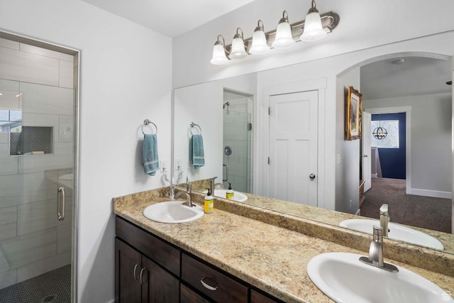 4126 E Cherokee, Eagle Mountain, UT 84005 - full bathroom with a sink, baseboards, a stall shower, and double vanity