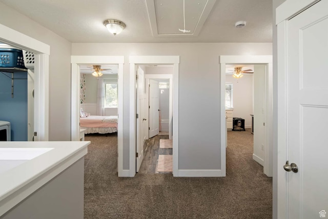 4126 E Cherokee, Eagle Mountain, UT 84005 - corridor featuring baseboards, attic access, carpet flooring, and a wealth of natural light