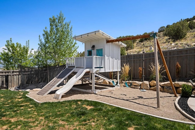 4126 E Cherokee, Eagle Mountain, UT 84005 - view of play area featuring a lawn and a fenced backyard