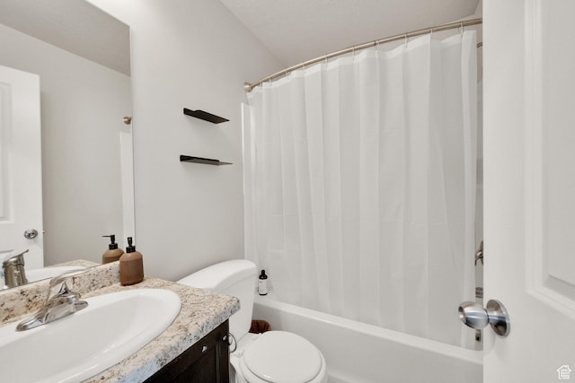 bathroom featuring toilet, shower / tub combo with curtain, and vanity