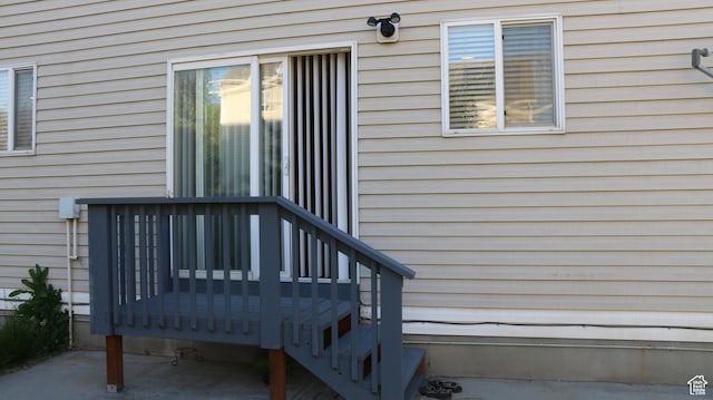 property entrance with a deck
