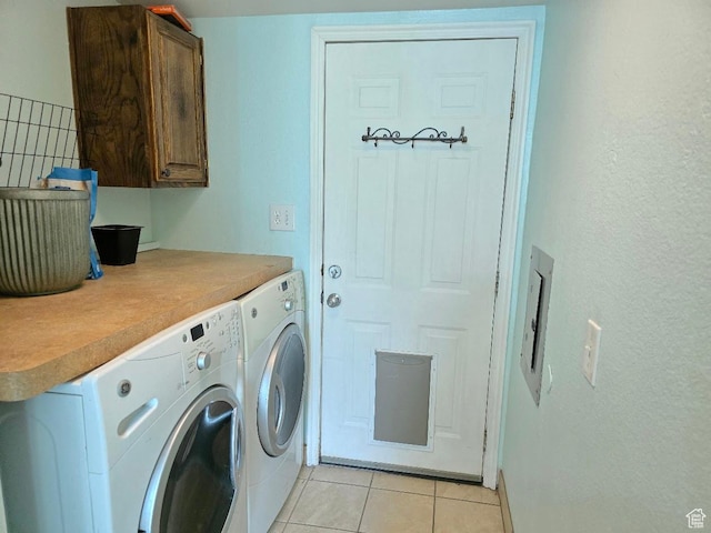 1177 W 1960 S, Logan, UT 84321 - washroom featuring cabinet space, independent washer and dryer, and light tile patterned floors