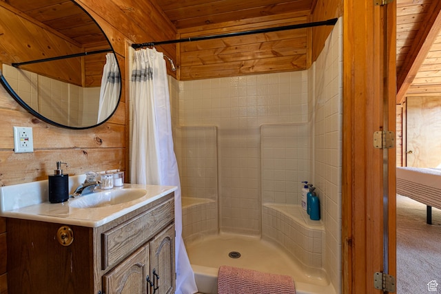bathroom with wooden ceiling, vanity, wood walls, and a shower with shower curtain