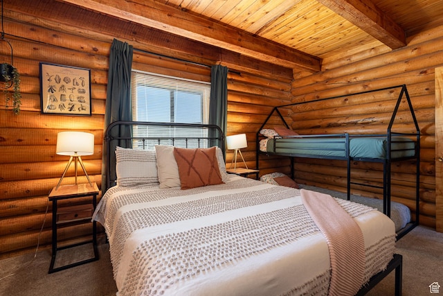 bedroom with carpet floors, wood ceiling, and beam ceiling
