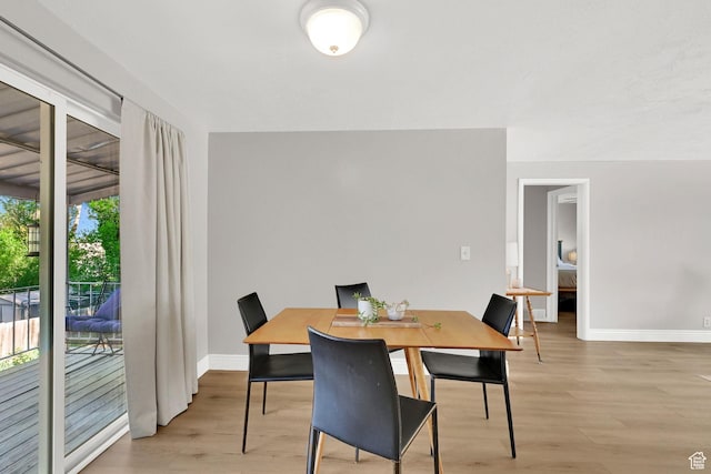 507 N 200 W, Brigham City, UT 84302 - dining space with baseboards and light wood-style floors