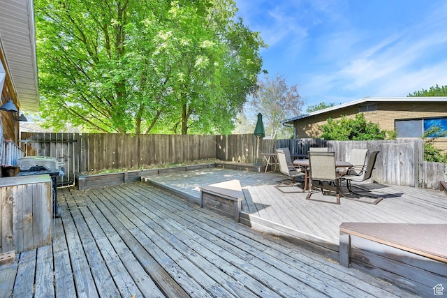 507 N 200 W, Brigham City, UT 84302 - deck with a fenced backyard and outdoor dining area