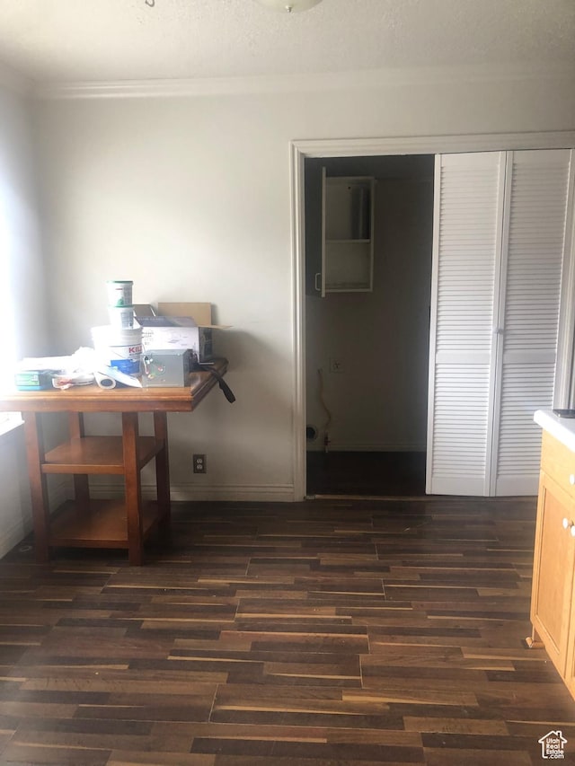 729 Timpie Rd, Tooele, UT 84074 - dining space with dark wood finished floors and ornamental molding