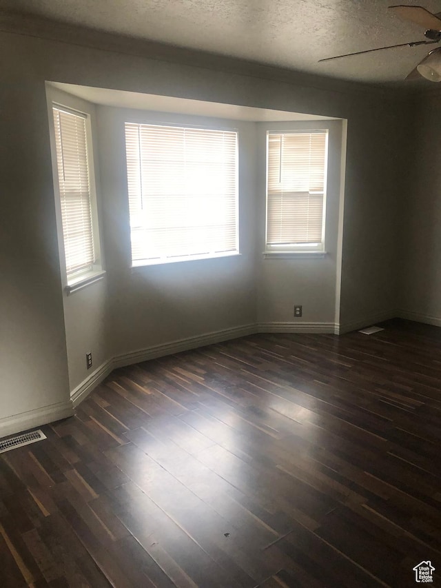 729 Timpie Rd, Tooele, UT 84074 - unfurnished room featuring a healthy amount of sunlight, ceiling fan, a textured ceiling, and visible vents