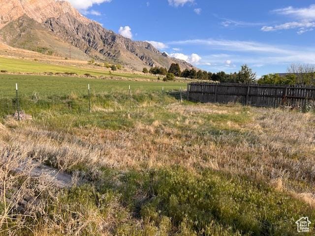 view of mountain feature featuring a rural view