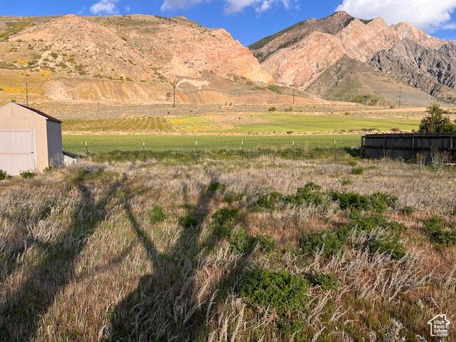 view of mountain feature with a rural view