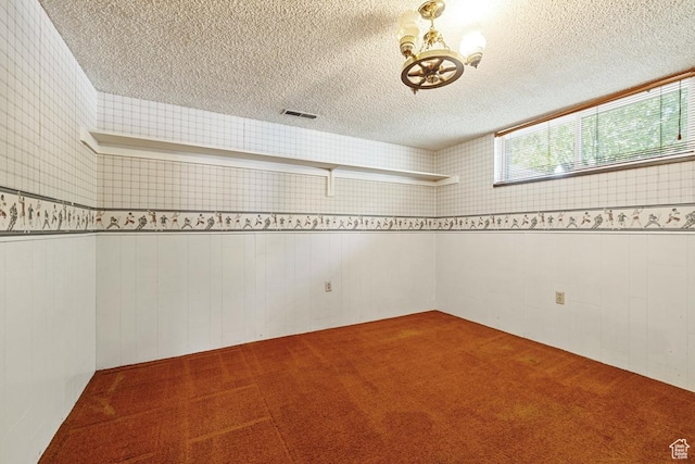344 E 900 N, Pleasant Grove, UT 84062 - carpeted spare room featuring an inviting chandelier, a textured ceiling, and visible vents