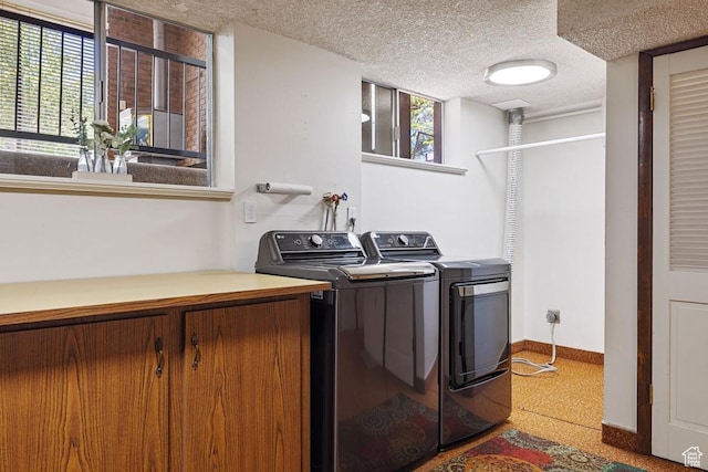 344 E 900 N, Pleasant Grove, UT 84062 - laundry area with baseboards, laundry area, a textured ceiling, and washer and clothes dryer
