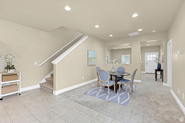 carpeted dining room with visible vents, recessed lighting, baseboards, and stairway