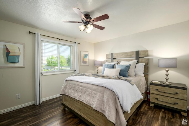 bedroom with baseboards, ceiling fan, and wood finished floors