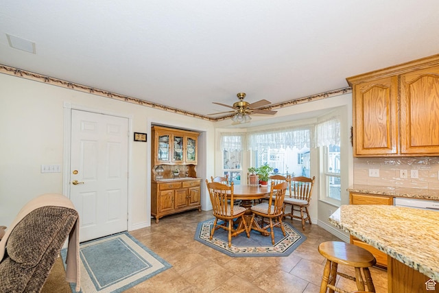 2983 W 2600 N, Plain City, UT 84404 - dining space featuring baseboards and ceiling fan
