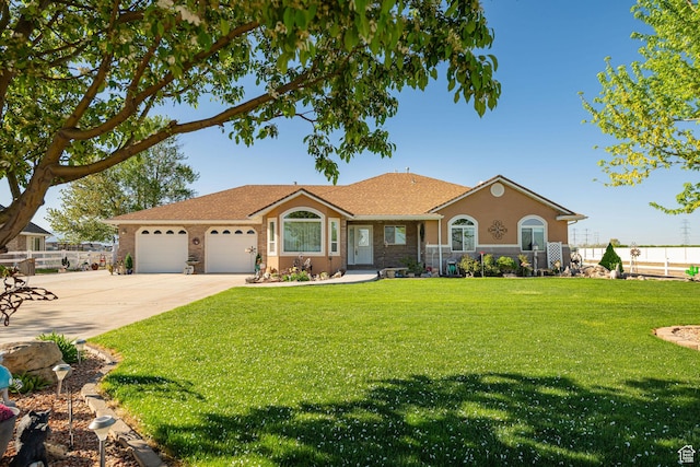 2983 W 2600 N, Plain City, UT 84404 - ranch-style home with a garage, fence, concrete driveway, and a front lawn