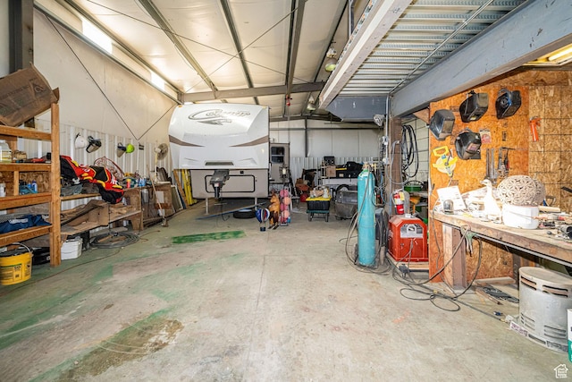 2983 W 2600 N, Plain City, UT 84404 - garage with a workshop area
