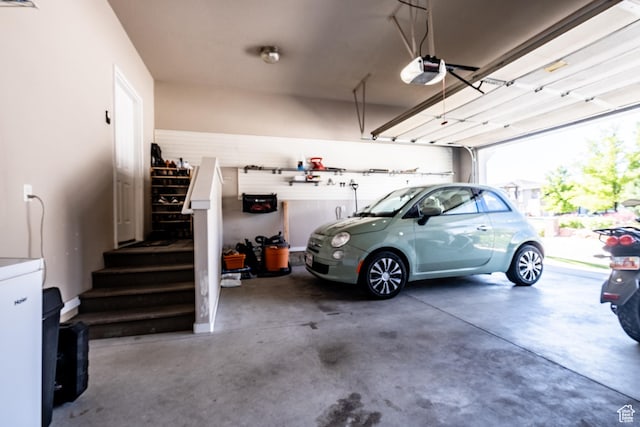 garage featuring a garage door opener