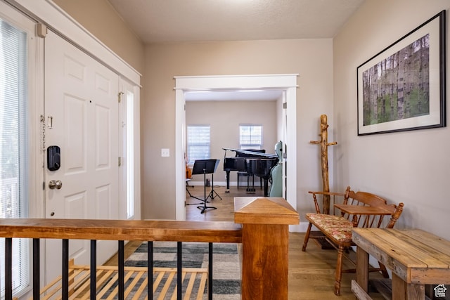 entryway with light wood-style floors
