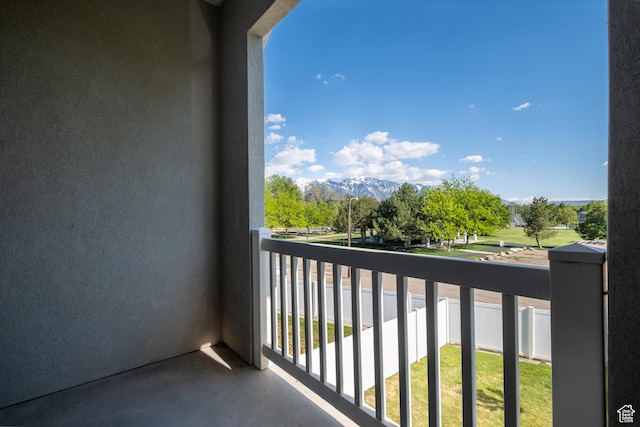 balcony featuring a mountain view