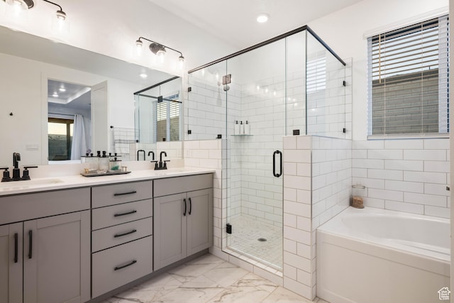733 W Juniper Hill Dr, St George, UT 84790 - bathroom with a sink, double vanity, marble finish floor, a shower stall, and a bath