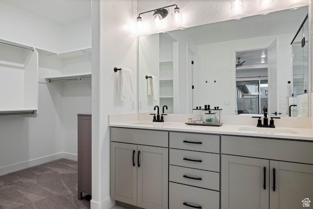 733 W Juniper Hill Dr, St George, UT 84790 - full bathroom with double vanity, a sink, baseboards, and ceiling fan