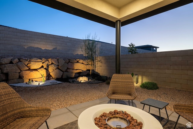733 W Juniper Hill Dr, St George, UT 84790 - view of patio / terrace with a fenced backyard and an outdoor fire pit