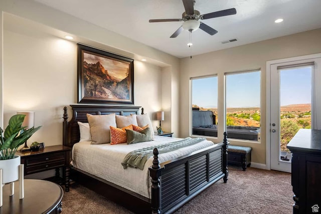 bedroom with carpet floors, access to outside, visible vents, and multiple windows