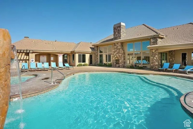 pool with a patio