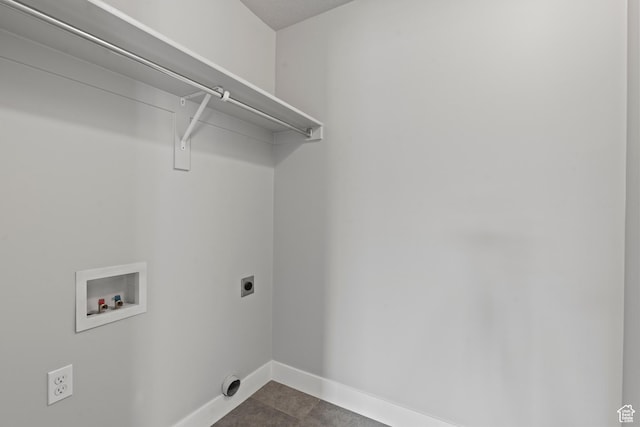 laundry room with hookup for an electric dryer, laundry area, baseboards, and hookup for a washing machine