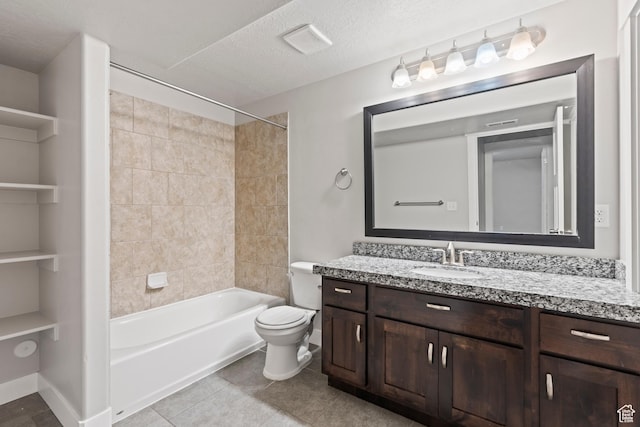 full bath with tile patterned flooring, vanity, toilet, a textured ceiling, and shower / washtub combination