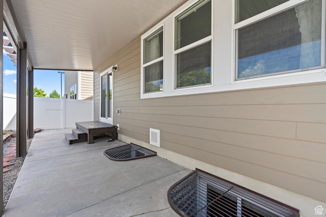 view of patio / terrace with fence