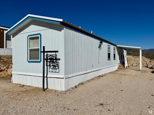 3149 S Prairie Dog Way, Garden City, UT 84028 - view of side of property with entry steps