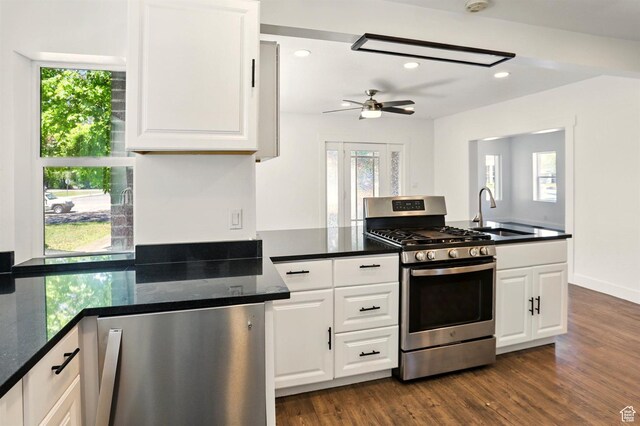 868 Washington Blvd, Ogden, UT 84404 - kitchen with a sink, white cabinetry, stainless steel gas range oven, and a healthy amount of sunlight