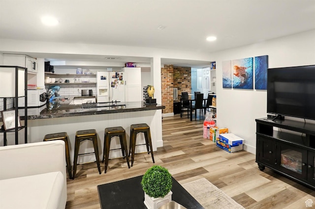 868 Washington Blvd, Ogden, UT 84404 - bar featuring recessed lighting, white appliances, baseboards, and light wood-style floors