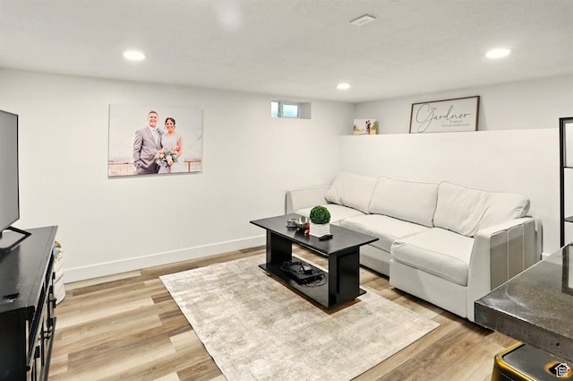 868 Washington Blvd, Ogden, UT 84404 - living room featuring recessed lighting, baseboards, and light wood-type flooring