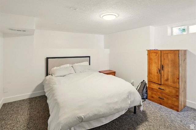868 Washington Blvd, Ogden, UT 84404 - carpeted bedroom with a textured ceiling, baseboards, and visible vents