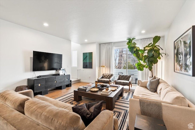 living room featuring recessed lighting and wood finished floors