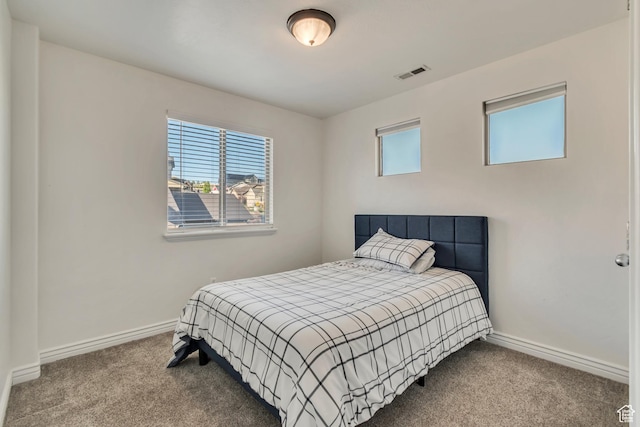 8983 N Barton Creek Dr, Eagle Mountain, UT 84005 - bedroom featuring baseboards, visible vents, and carpet