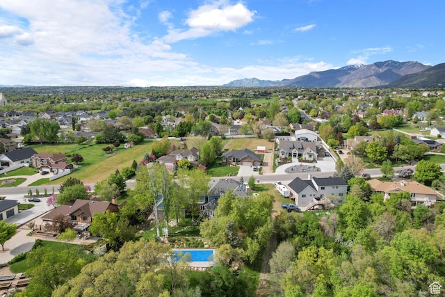 drone / aerial view with a mountain view and a residential view
