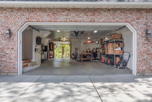 garage with concrete driveway