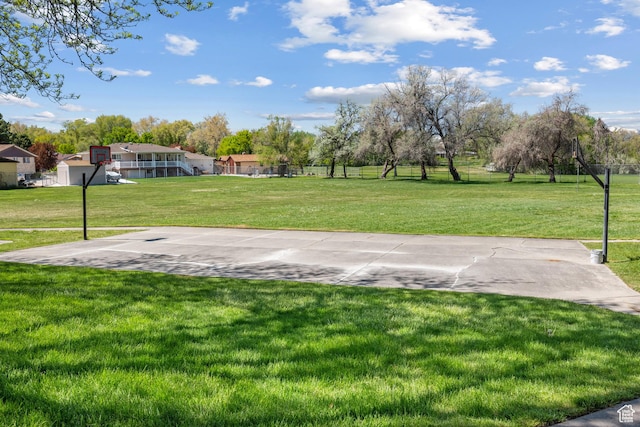 view of yard featuring community basketball court