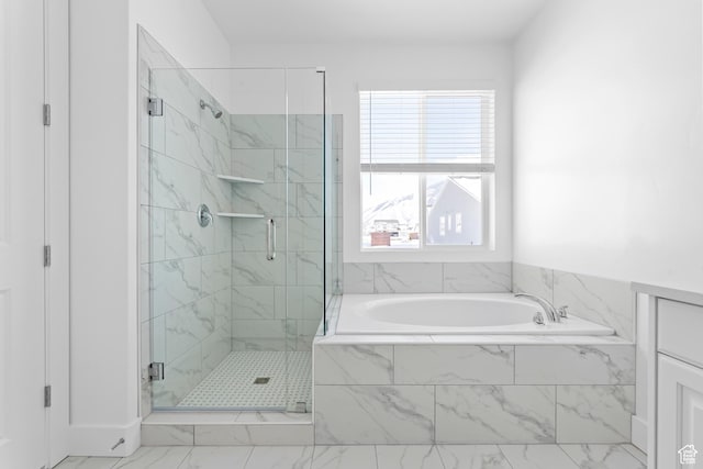 131 N 950 E Unit 35, Tremonton, UT 84337 - full bathroom featuring marble finish floor, a garden tub, and a stall shower
